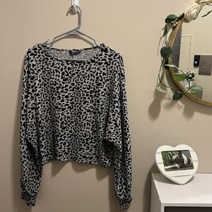 New never worn black and grey cheetah print sweater